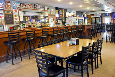 Bluffton_Resort_&_Bar_05 Bar & Grill dining area with bar seating and tables